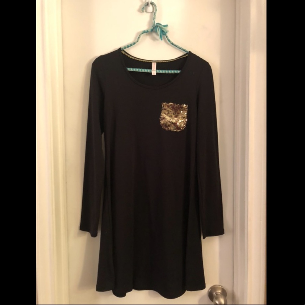 Black long-sleeve dress with gold sequin pocket